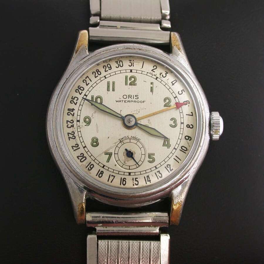 Steel Oris WW Pointer date Caliber 453 1950s